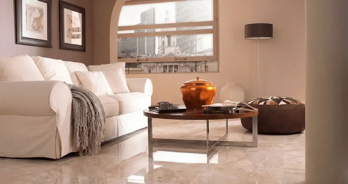 Modern living room with professionally installed marble flooring, a beige sofa, coffee table in Sarasota, FL